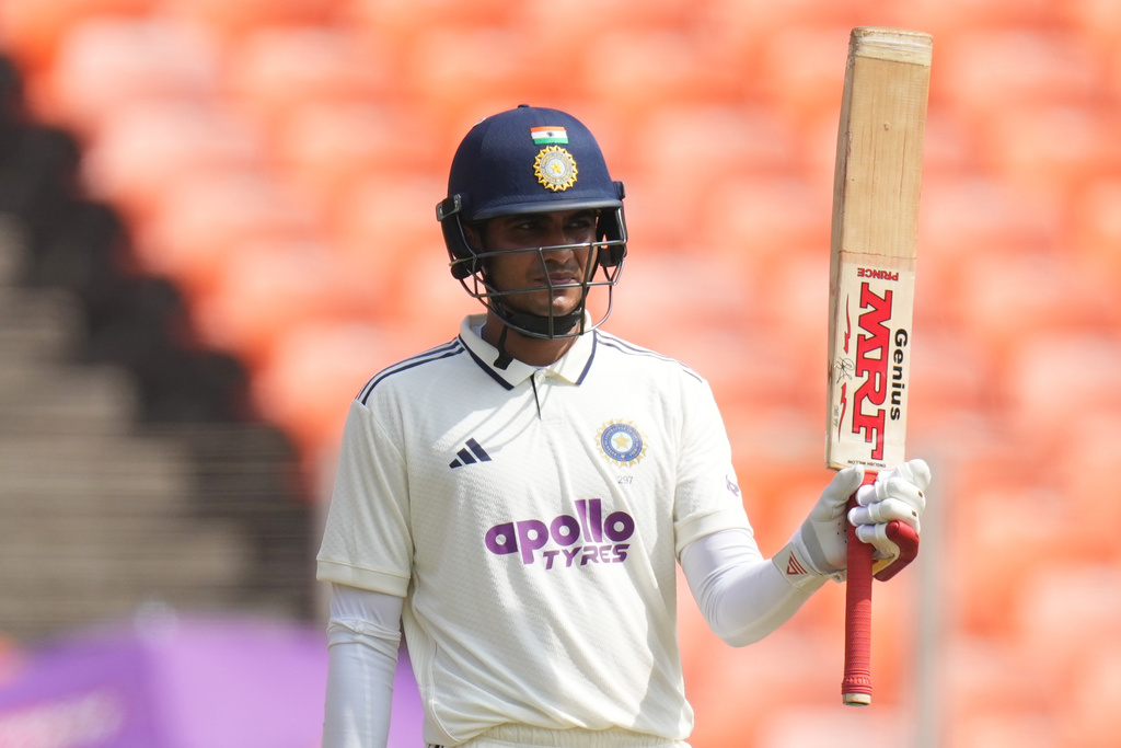 India's captain Shubman Gill celebrates after scoring fifty runs on the second day of the first Test cricket match between India and West Indies at Narendra Modi Stadium in Ahmedabad, India, Friday, Oct. 3, 2025. (AP Photo/Ajit Solanki)