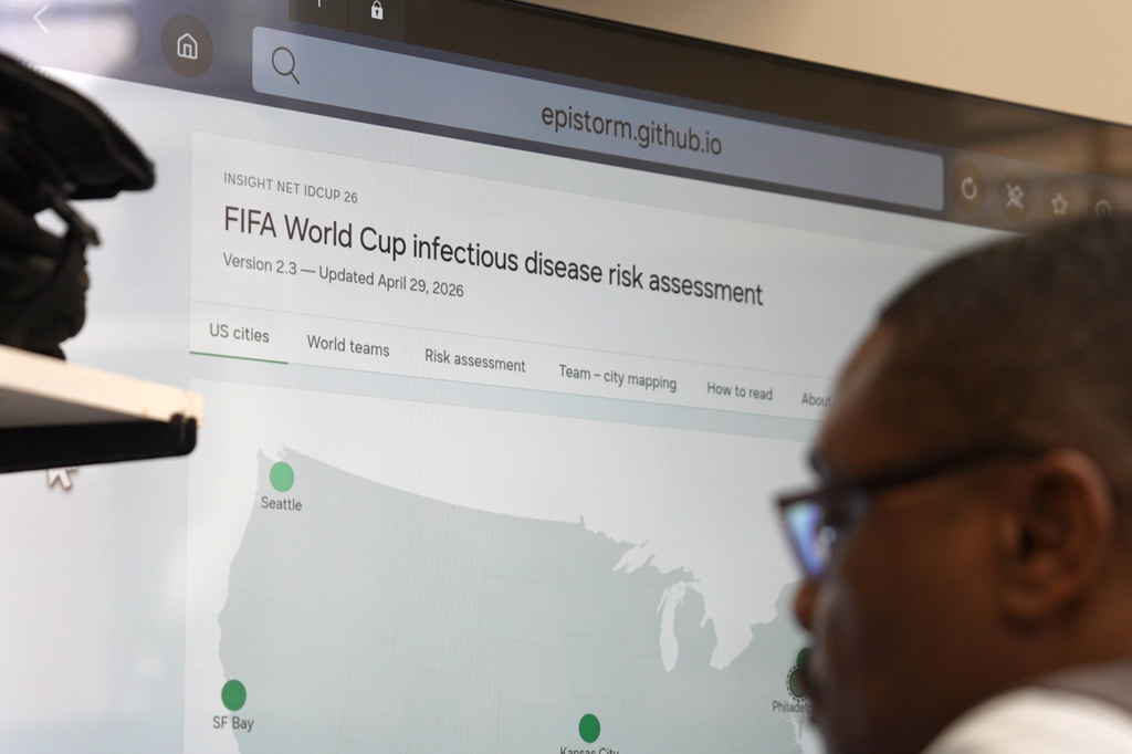 A screen displays infectious disease risk assessments for the World Cup at Georgetown's Health Security Operations Center in Washington on June 3, 2026. (AP Photo/Shelby Lum)