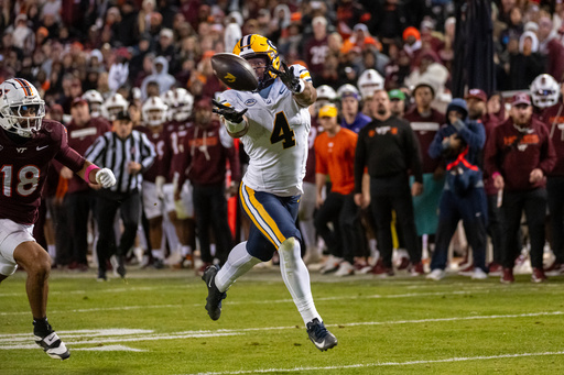 California wide receiver Jordan King (4) can't reach a pass in the endzone in the second overtime during an NCAA college football game between California and Virginia Tech, Friday Oct. 24, 2025, in Blacksburg, Va., (AP Photo/Robert Simmons) California wide receiver Jordan King (4) can't reach a pass in the endzone in the second overtime during an NCAA college football game between California and Virginia Tech, Friday Oct. 24, 2025, in Blacksburg, Va., (AP Photo/Robert Simmons)