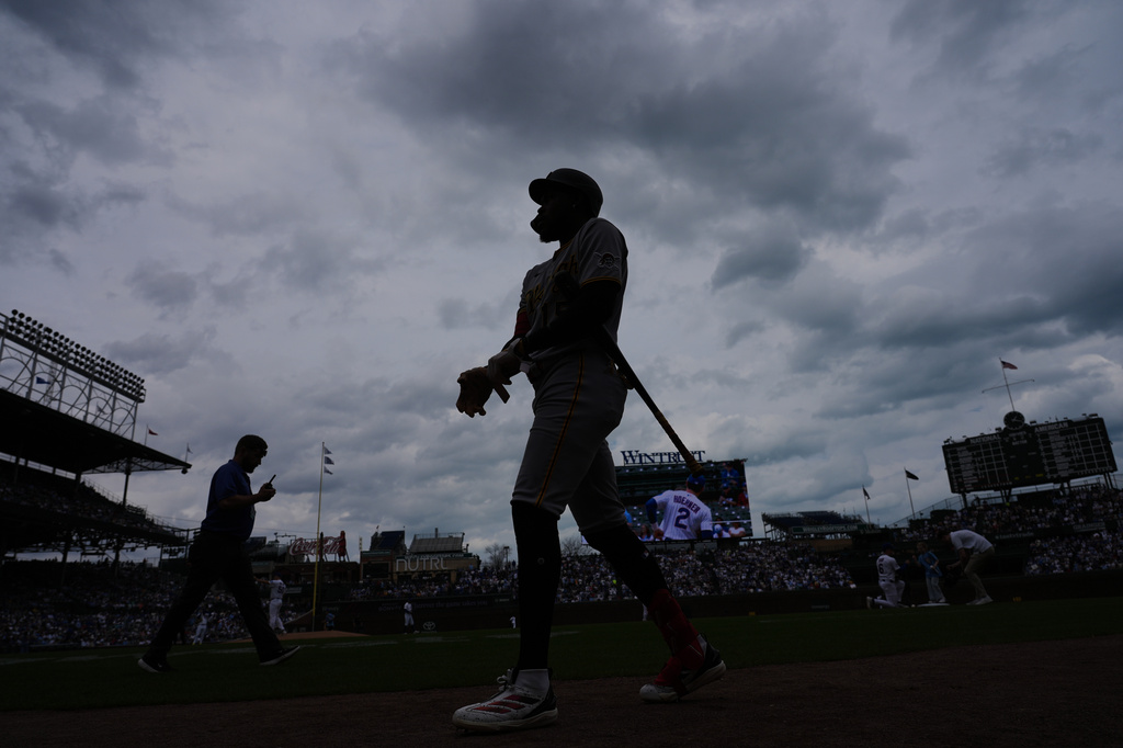 Pittsburgh Pirates' Oneil Cruz walks to batting during the first inning of a baseball game against the Chicago Cubs, in Chicago, Sunday, April 12, 2026. (AP Photo/Nam Y. Huh)