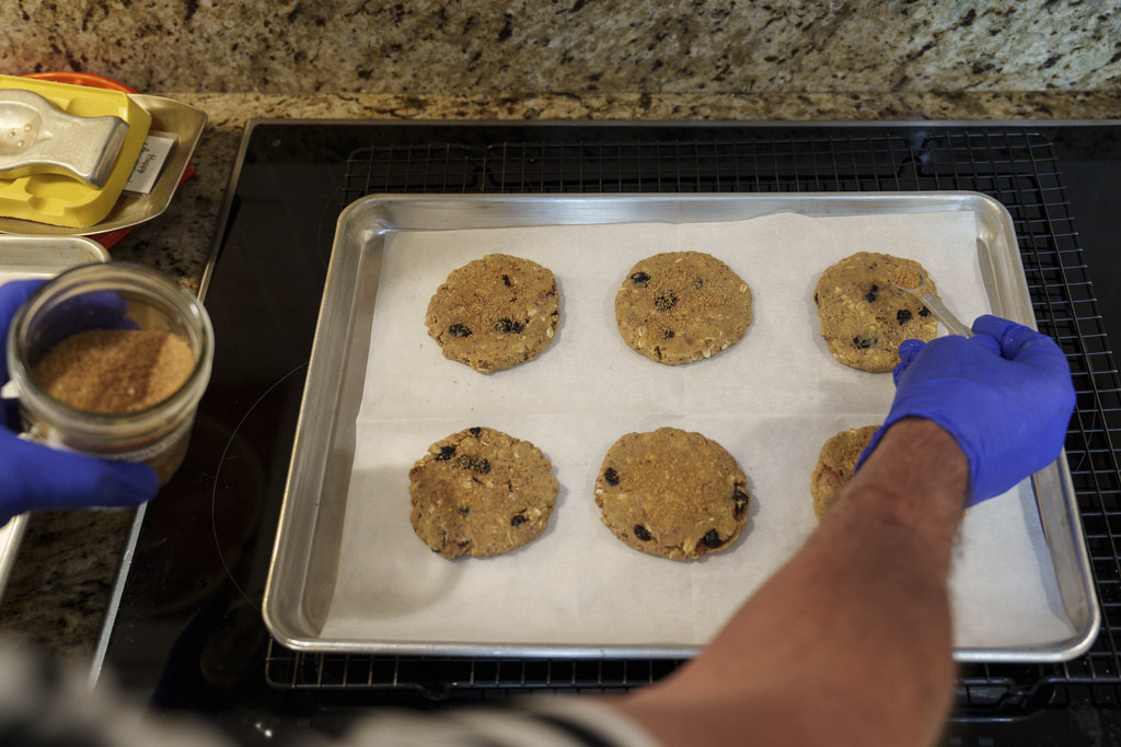 Hans Ewaldsen bakes energy cookies for Community Loaves at his home in Edmonds, Wash., Saturday, Sept. 6, 2025. (AP Photo/Annika Hammerschlag)