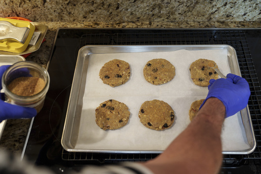 Hans Ewaldsen bakes energy cookies for Community Loaves at his home in Edmonds, Wash., Saturday, Sept. 6, 2025. (AP Photo/Annika Hammerschlag) Hans Ewaldsen bakes energy cookies for Community Loaves at his home in Edmonds, Wash., Saturday, Sept. 6, 2025. (AP Photo/Annika Hammerschlag)