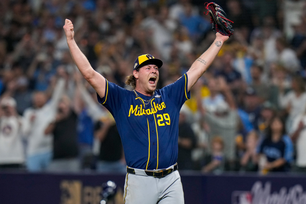 Milwaukee Brewers pitcher Trevor Megill celebrates after winning baseball's World Series, against the Tampa Bay Rays, Wednesday, Oct. 28, 2026, in St. Petersburg, Fla.(AP Photo/Chris O'Meara)