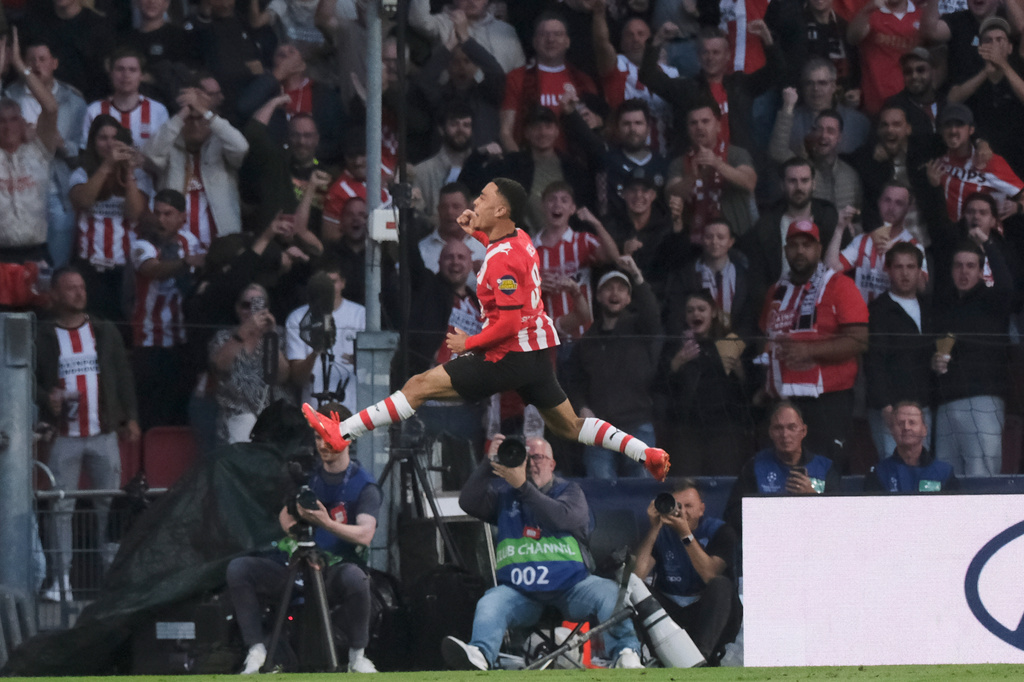 PSV's Sergino Dest celebrates after scoring his side's first goal during the Champions League opening phase soccer match between PSV and Shakhtar in Eindhoven, Netherlands, Thursday, Sept. 10, 2026. (AP Photo/Patrick Post)