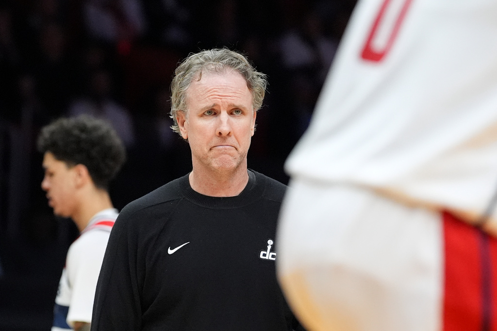 Washington Wizards head coach Brian Keefe watches during the second half of an NBA basketball game against the Miami Heat, Tuesday, March 10, 2026, in Miami. (AP Photo/Rebecca Blackwell)