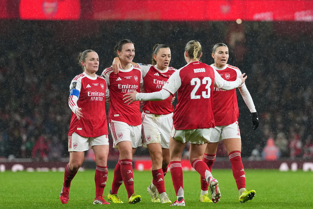 Arsenal's Lotte Wubben-Moy, 2nd left, celebrates after scoring her side's second goal during the Women's Champions Cup final soccer match between Arsenal FC and SC Corinthians in London, Sunday, Feb. 1, 2026. (AP Photo/Alastair Grant)