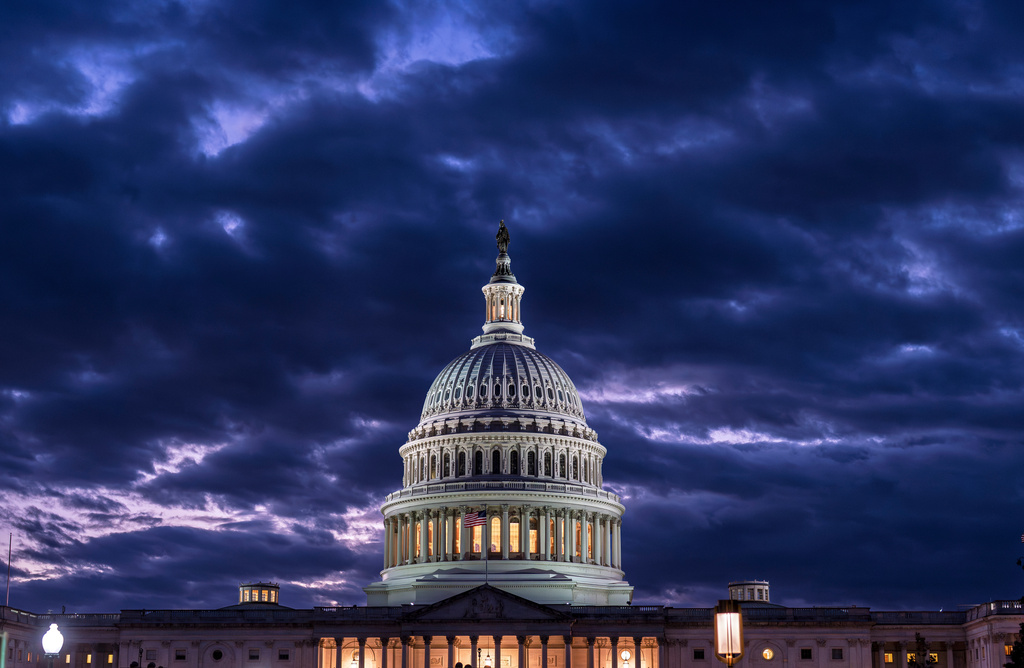 FILE - The Capitol is seen at nightfall in Washington on Oct. 22, 2025. (AP Photo/J. Scott Applewhite, File)