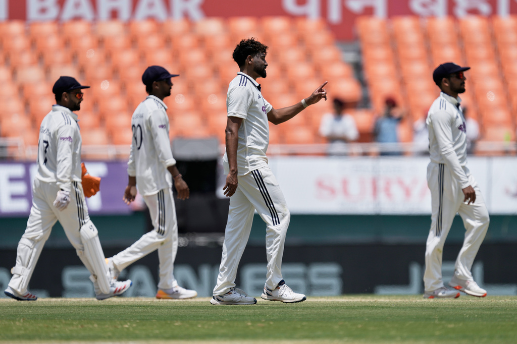 India's Mohammed Siraj, second right, celebrates the wicket of Afghanistan's Abdul Malik on day three of the cricket test match between Afghanistan and India in New Chandigarh, India, Monday, June 8, 2026. (AP Photo/Ashwini Bhatia)