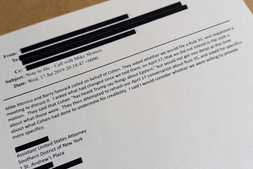 An email that was included in the U.S. Department of Justice release of the Jeffrey Epstein files is photographed Monday, Dec. 22, 2025. (AP Photo/Jon Elswick)