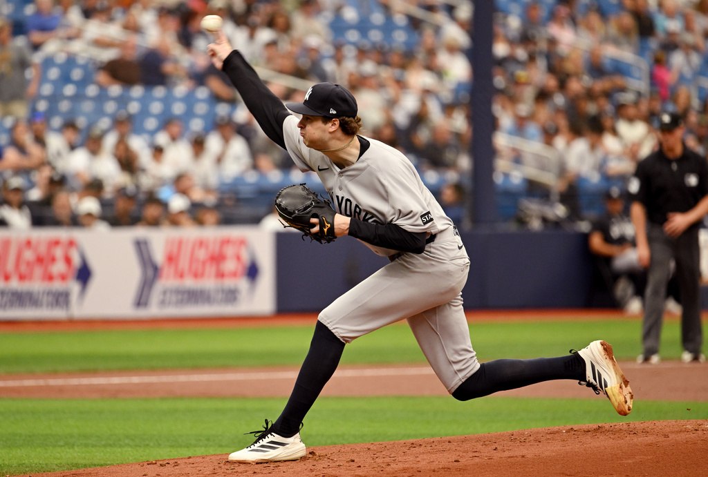 New York Yankees pitcher Cam Schlittler throws during the first inning of a baseball game against the Tampa Bay Rays, Sunday, April 12, 2026, in St. Petersburg, Fla. (AP Photo/Jason Behnken)