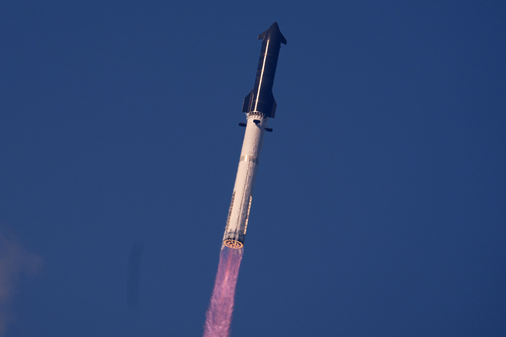 SpaceX's mega rocket Starship makes a test flight from Starbase, Texas, Friday, May 22, 2026. (AP Photo/Eric Gay)