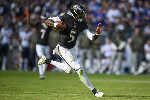 Baltimore Ravens quarterback Tyler Huntley (5) runs the ball during the second half an NFL football game against the Chicago Bears, Sunday, Oct. 26, 2025, in Baltimore. (AP Photo/Nick Wass) Baltimore Ravens quarterback Tyler Huntley (5) runs the ball during the second half an NFL football game against the Chicago Bears, Sunday, Oct. 26, 2025, in Baltimore. (AP Photo/Nick Wass)