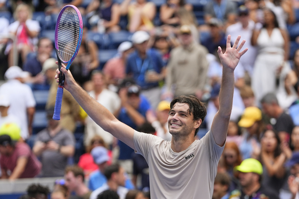 Taylor Fritz, of the United States, reacts after defeating Emilio Nava, of the United States, during the first round of the US Open tennis championships, Sunday, Aug. 24, 2025, in New York. (AP Photo/Yuki Iwamura)