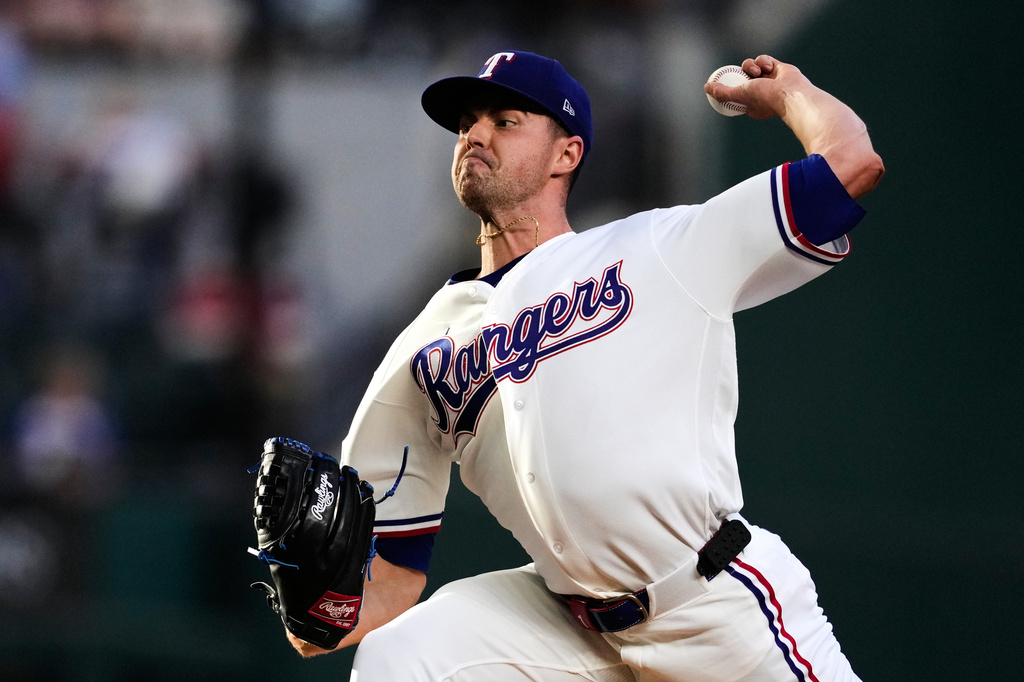 Texas Rangers pitcher MacKenzie Gore throws to the Arizona Diamondbacks in the first inning of a baseball game Tuesday, May 12, 2026, in Arlington, Texas. (AP Photo/Tony Gutierrez)