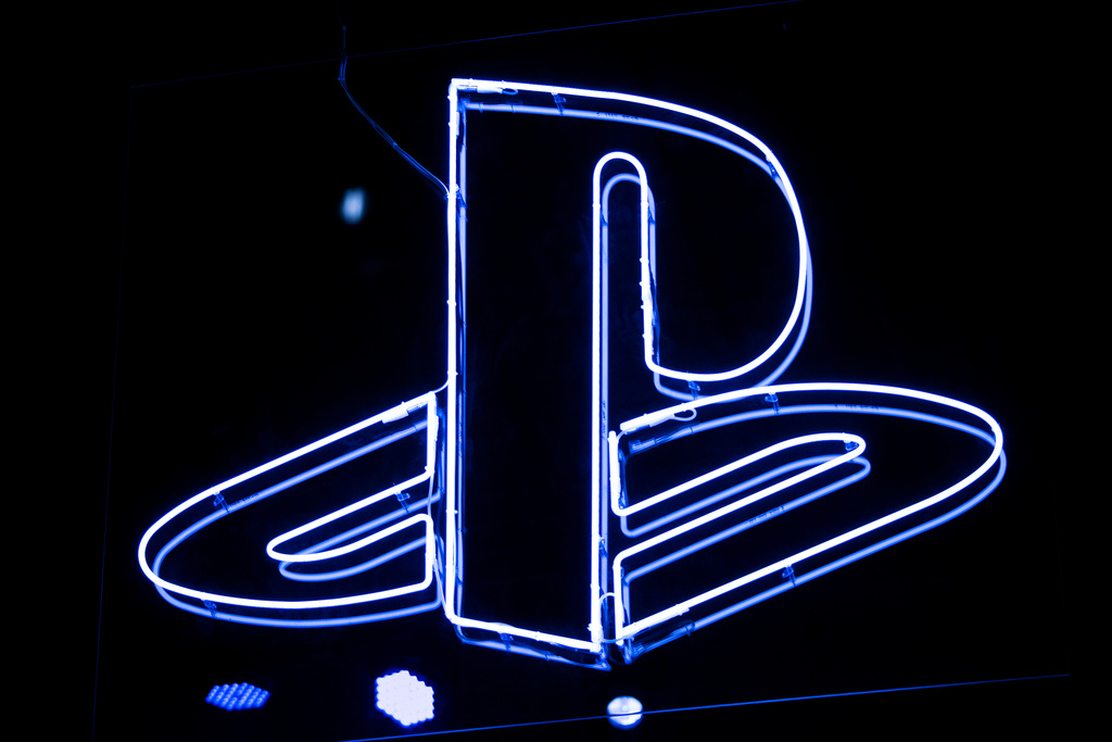 The Playstation logo appears at the Paris Games Week in Paris on Nov. 3, 2017. (AP Photo/Kamil Zihnioglu, File)
