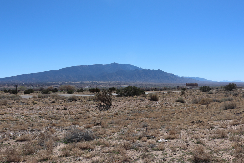 An empty lot between a fire station and a soccer field in the Pueblo of Santa Ana, N.M., near Albuquerque, is seen Friday, March 13, 2026. (AP Photo/Savannah Peters)