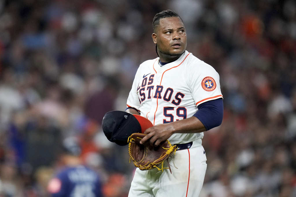 Houston Astros starting pitcher Framber Valdez (59) walks to the dugout after being pulled from the game during the fifth inning against the Seattle Mariners, Saturday, Sept. 20, 2025, in Houston. (AP Photo/Eric Christian Smith)