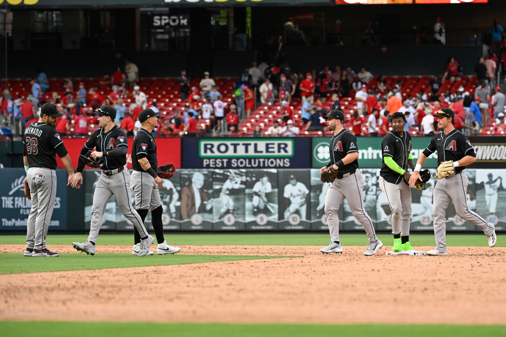 The Arizona Diamondbacks celebrate after defeating the St. Louis Cardinals after a baseball game, Thursday, July 23, 2026, in St. Louis. (AP Photo/Joe Puetz)