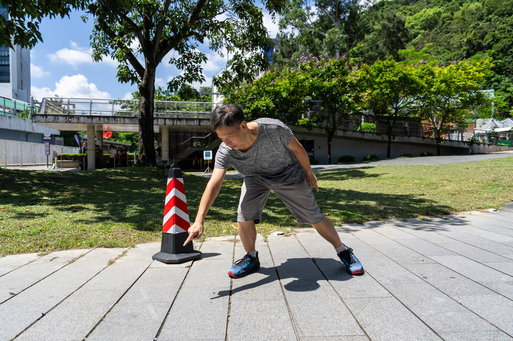 Tang Ngok-kwan visits the The Chinese University of Hong Kong, an area where the statue of the Goddess of Democracy was placed to commemorate the Tiananmen crackdown in Hong Kong, Saturday, July 11, 2026. (AP Photo/Chan Long Hei)
