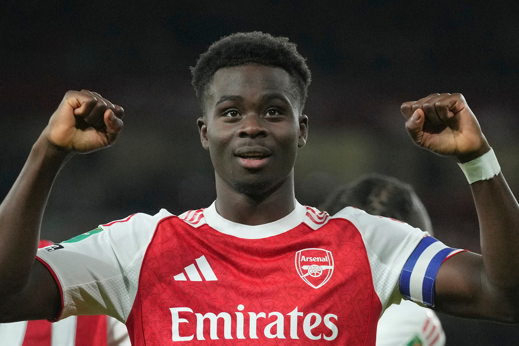 Arsenal's Bukayo Saka celebrates after scoring his side's second goal during the English League Cup soccer match between Arsenal and Brighton & Hove Albion in London, Wednesday, Oct. 29, 2025. (AP Photo/Kin Cheung)