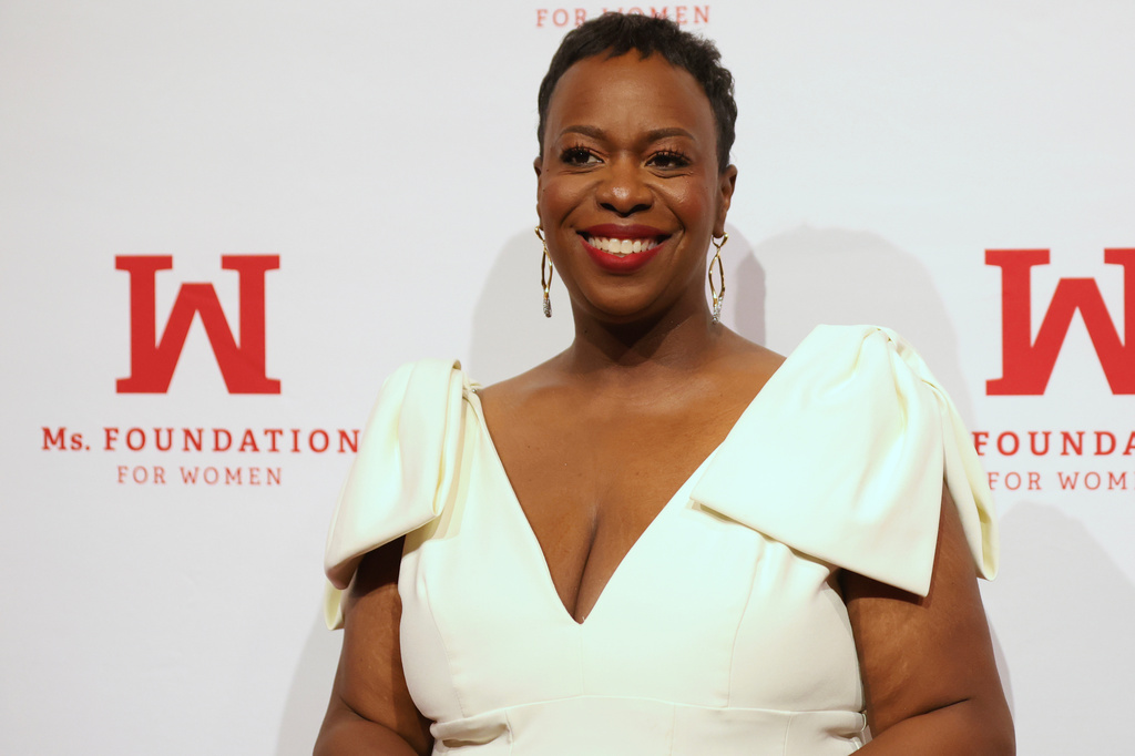 Tracy Sturdivant, center, poses for photos on the red carpet before the Ms. Foundation's Women of Vision Awards Gala, Tuesday, April 28, 2026, in New York. (AP Photo/Heather Khalifa)