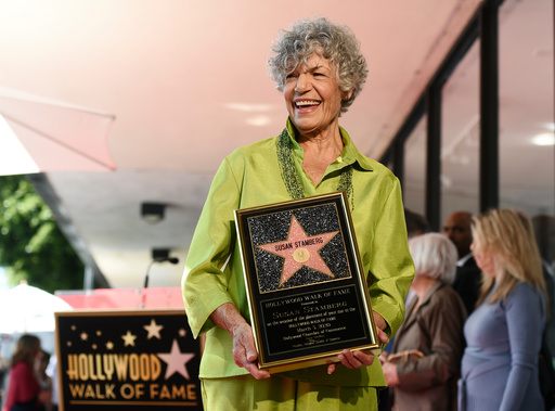 FILE - National Public Radio broadcast journalist Susan Stamberg holds up a replica of her new star on the Hollywood Walk of Fame following a ceremony, in Los Angeles, March 3, 2020. Stamberg, a ‘founding mother’ of NPR and the first female broadcaster to host a national news program, died Thursday, Oct. 16, 2025. She was 87. (AP Photo/Chris Pizzello, File) FILE - National Public Radio broadcast journalist Susan Stamberg holds up a replica of her new star on the Hollywood Walk of Fame following a ceremony, in Los Angeles, March 3, 2020. Stamberg, a ‘founding mother’ of NPR and the first female broadcaster to host a national news program, died Thursday, Oct. 16, 2025. She was 87. (AP Photo/Chris Pizzello, File)