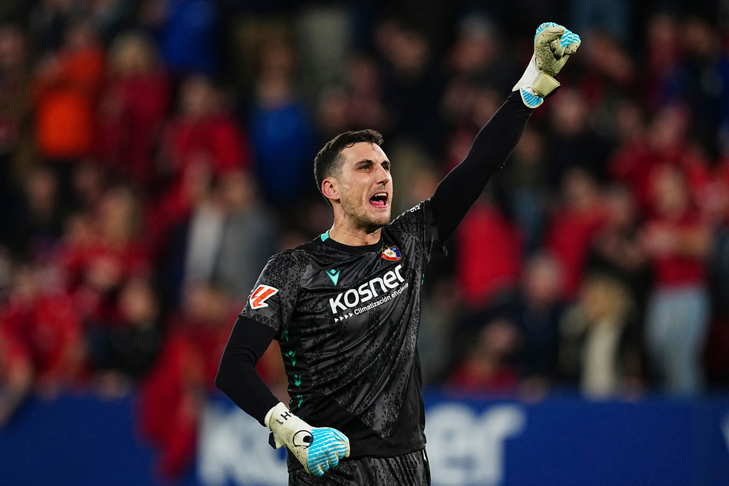 Osasuna's goalkeeper Sergio Herrera celebrates at the end of the Spanish La Liga soccer match between Osasuna and Real Madrid in Pamplona, Spain, Saturday, Feb. 21, 2026. (AP Photo/Miguel Oses)