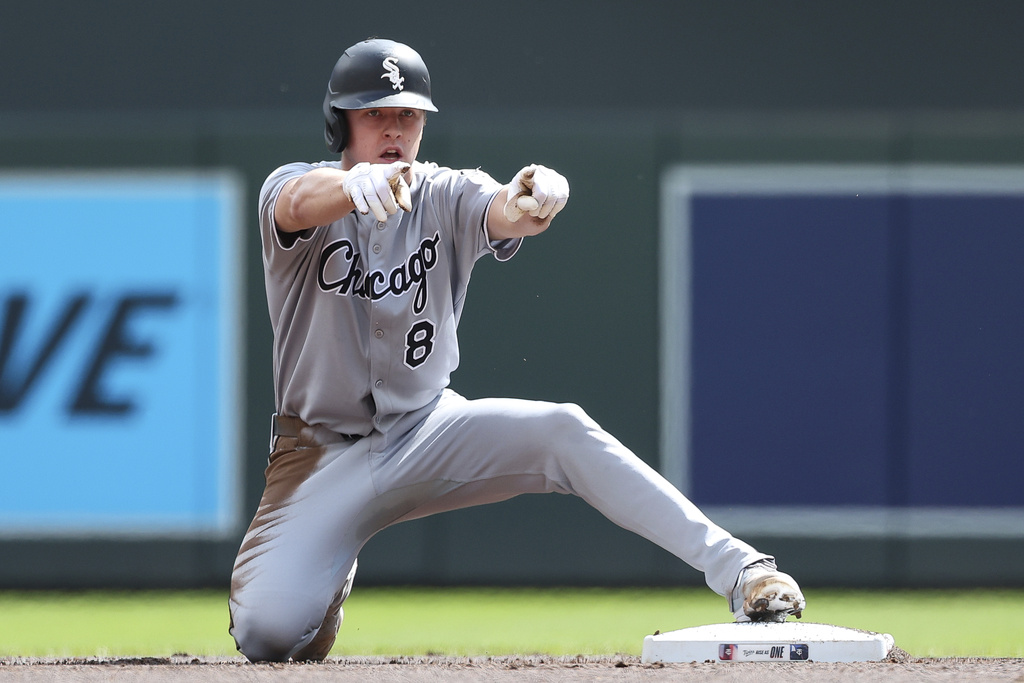 Chicago White Sox's Kyle Teel celebrates after his double against the Minnesota Twins during the first inning of a baseball game Monday, Sept. 1, 2025, in Minneapolis. (AP Photo/Matt Krohn)
