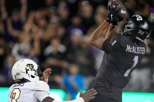 TCU wide receiver Eric McAlister (1) catches a touchdown pass as Colorado defensive back Teon Parks (3) defends in the second half of an NCAA college football game Saturday, Oct. 4, 2025, in Fort Worth, Texas. (AP Photo/Tony Gutierrez) TCU wide receiver Eric McAlister (1) catches a touchdown pass as Colorado defensive back Teon Parks (3) defends in the second half of an NCAA college football game Saturday, Oct. 4, 2025, in Fort Worth, Texas. (AP Photo/Tony Gutierrez)