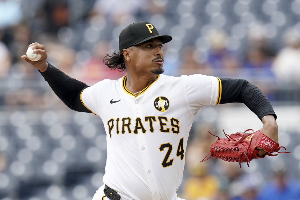 Pittsburgh Pirates pitcher Johan Oviedo delivers during the first inning of a baseball game against the Toronto Blue Jays Wednesday, Aug. 20, 2025, in Pittsburgh. (AP Photo/Matt Freed)