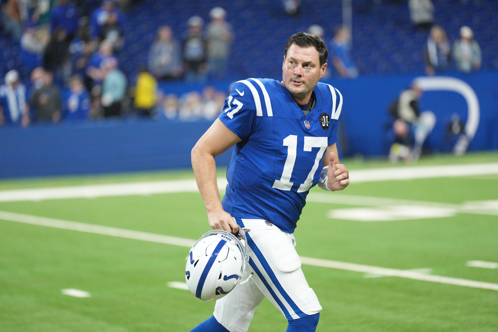 Indianapolis Colts quarterback Philip Rivers jogs off the field following an NFL football game against the Jacksonville Jaguars Sunday, Dec. 28, 2025, in Indianapolis. (AP Photo/AJ Mast)