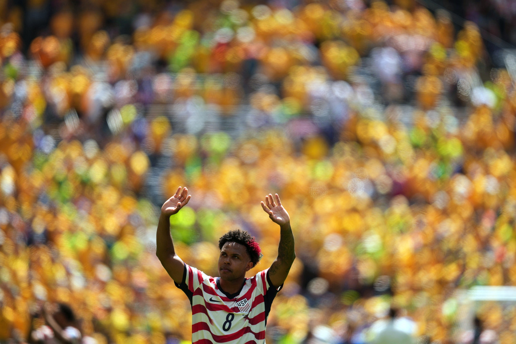 United States' Weston McKennie (8) waves to the fans after the World Cup Group D soccer match between the United States and Australia in Seattle, Friday, June 19, 2026. (AP Photo/Abbie Parr)