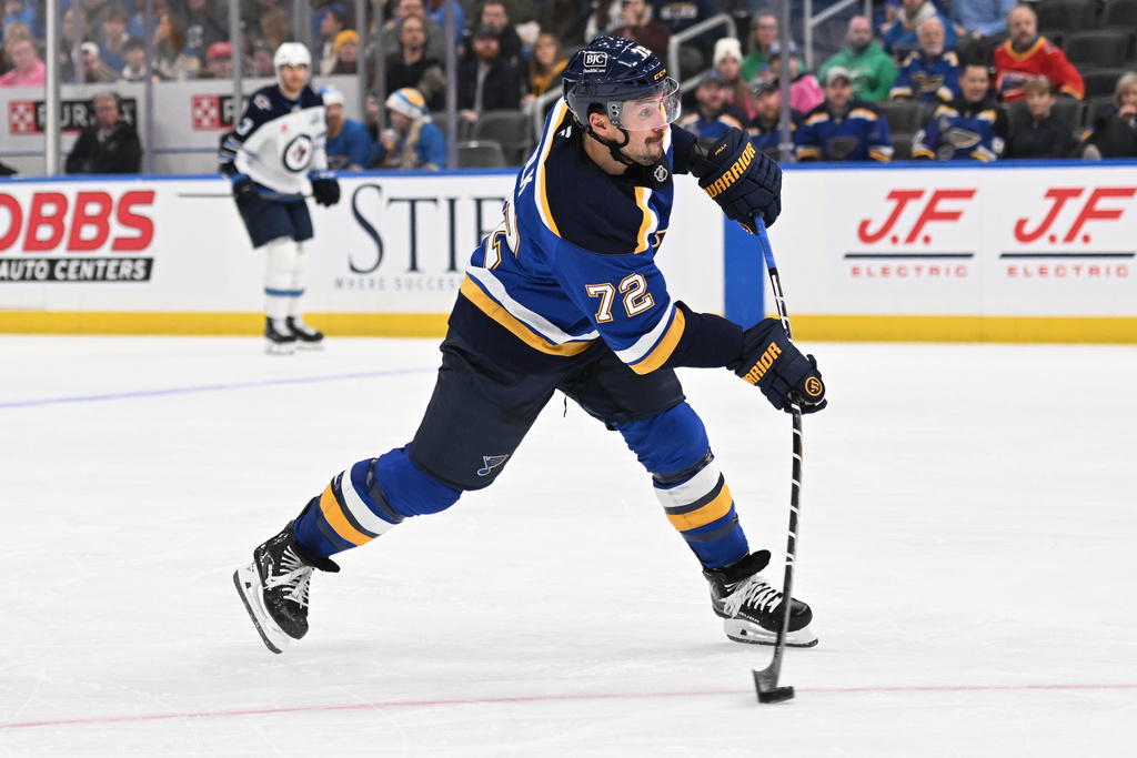 St. Louis Blues defenseman Justin Faulk (72) shoot and scores a goal against the Winnipeg Jets during the second period of an NHL hockey game on Wednesday, Dec. 17, 2025, in St. Louis. (AP Photo/Joe Puetz)