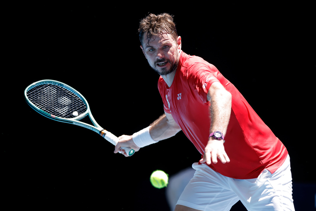 Stan Wawrinka of Switzerland plays a forehand to Arthur Rinderknech of France during their singles match at the United Cup tennis tournament in Perth, Saturday, Jan. 3, 2026. (Richard Wainwright/AAP Image via AP)