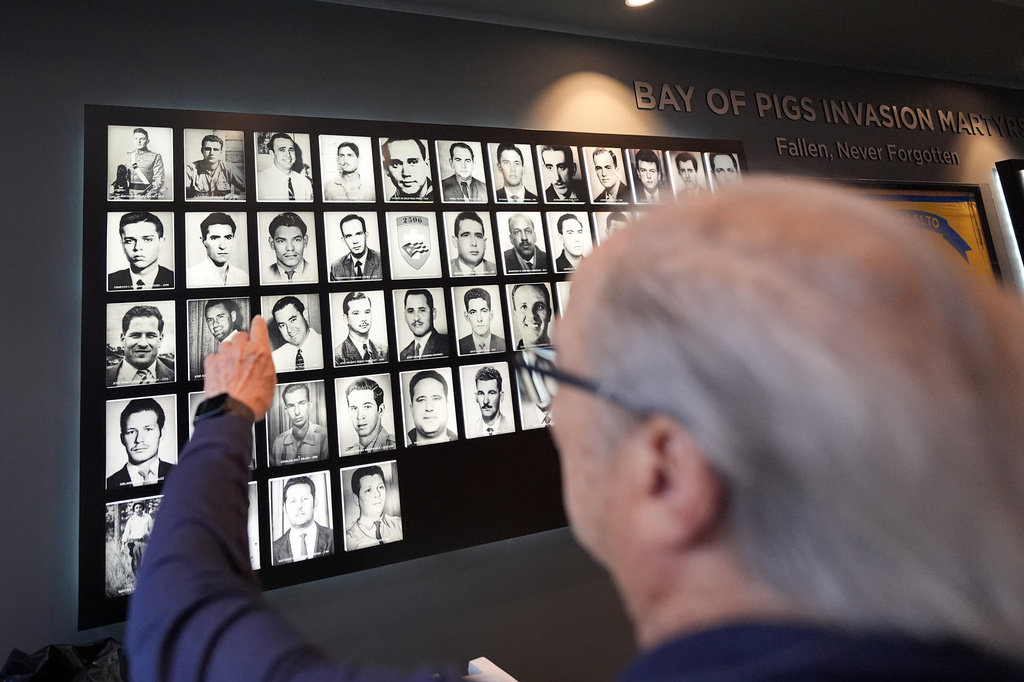 Bay of Pigs veteran Francisco J. Hernandez points out fellow Brigade 2506 members he knew personally who were killed in the 1961 invasion as the Bay of Pigs Museum prepares to reopen in a new and larger space, in Miami's Little Havana neighborhood., Tuesday, April 7, 2026. (AP Photo/Rebecca Blackwell)