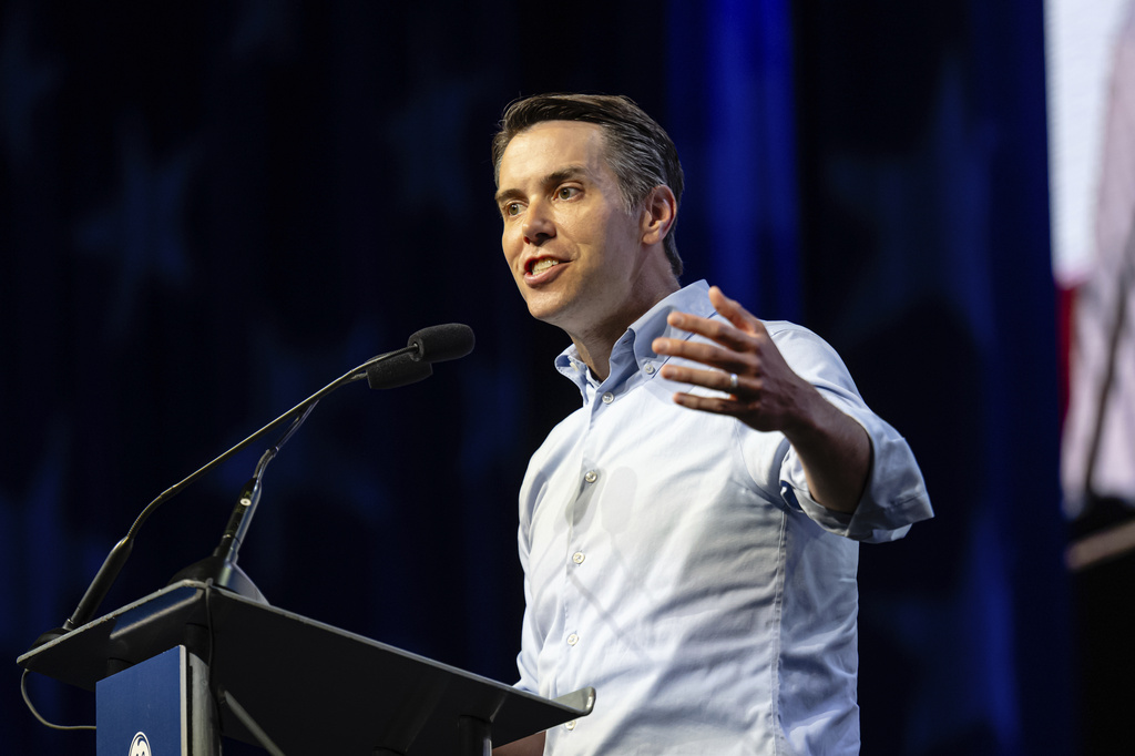 Rep. Morgan McGarvey, D-Ky., speaks on stage at GE Appliances global headquarters, Wednesday, Aug 13, 2025, in Louisville, Ky. (AP Photo/Jon Cherry)