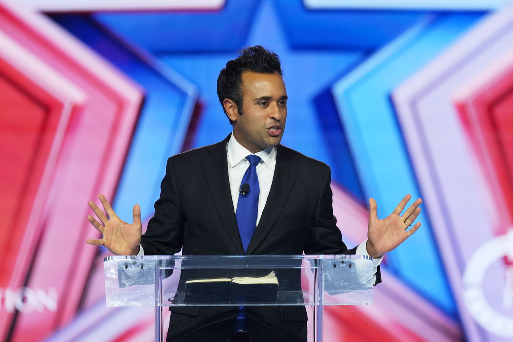 Vivek Ramaswamy speaks during Turning Point USA's AmericaFest 2025, Friday, Dec. 19, 2025, in Phoenix. (AP Photo/Ross D. Franklin)