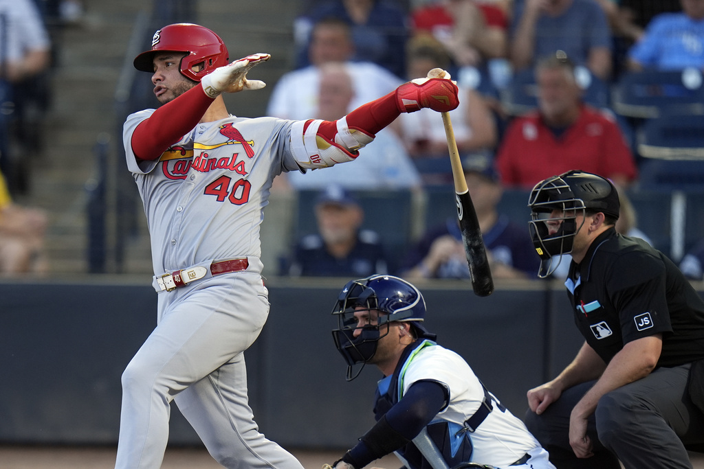 St. Louis Cardinals' Willson Contreras (40) follows through on a single off Tampa Bay Rays pitcher Joe Boyle during the first inning of a baseball game Thursday, Aug. 21, 2025, in Tampa, Fla. (AP Photo/Chris O'Meara)