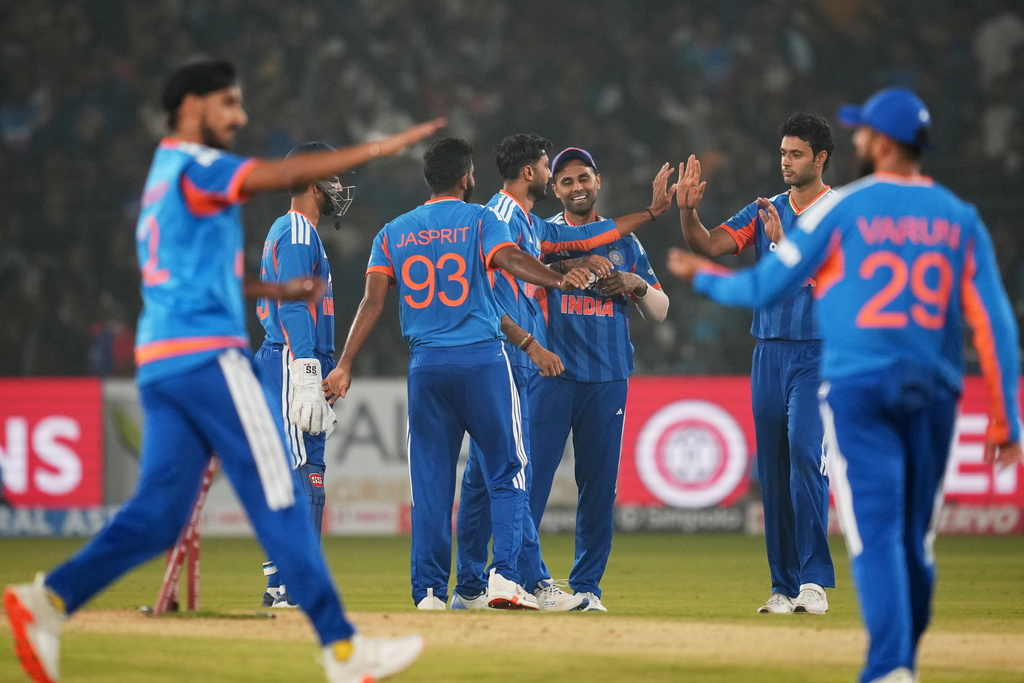 India's players celebrate the wicket of South Africa's captain Aiden Markram during the first T20 International cricket match between India and South Africa in Cuttack, India, Tuesday, Dec. 9, 2025. (AP Photo/Rafiq Maqbool)