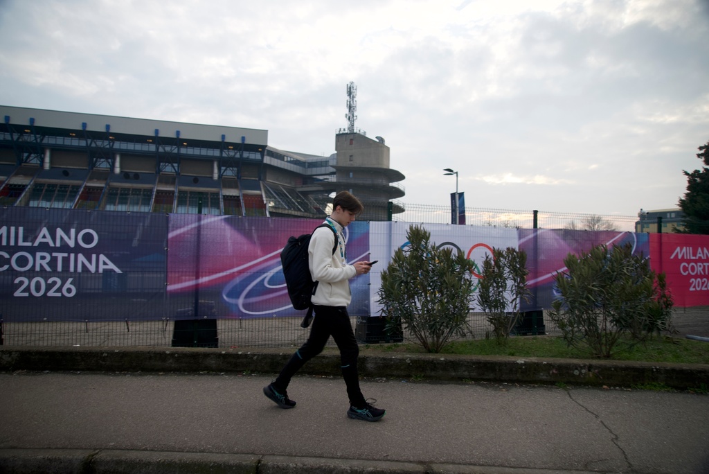 Ukrainian figure skater Kyrylo Marsak walks outside the Milan ice skating arena on his way to practice his routine, at the 2026 Winter Olympics, in Milan, Italy, Sunday, Feb. 8, 2026. (AP Photo/Vasilisa Stepanenko)