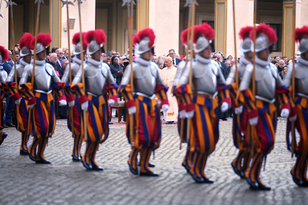 Pope Leo XIV attends the swearing in ceremony of 27 Pontifical Swiss Guards cadets in the St. Damasus Courtyard at the Vatican, Saturday, Oct. 4, 2025. (AP Photo/Andrew Medichini)