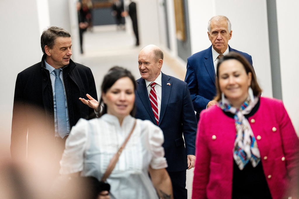 Sen. Chris Coons, D-Del., and Sen. Thom Tillis, R-N.C., arrive as members of the Danish Parliament and a Greenlandic committee meet with American Congress members in the Danish Parliament in Copenhagen, Friday, Jan. 16, 2026. (Ida Marie Odgaard/Ritzau Scanpix via AP)