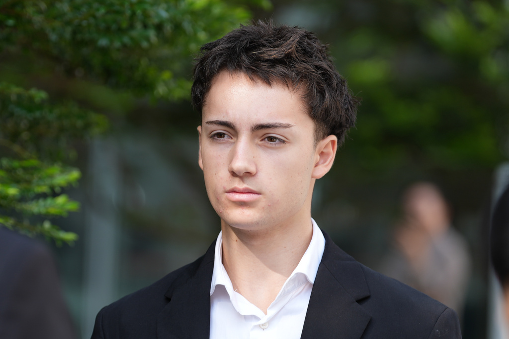 Didier Gaspard Owen Maximilien leaves the State Courts building in Singapore, Thursday, July 30, 2026. (AP Photo/David Hu)