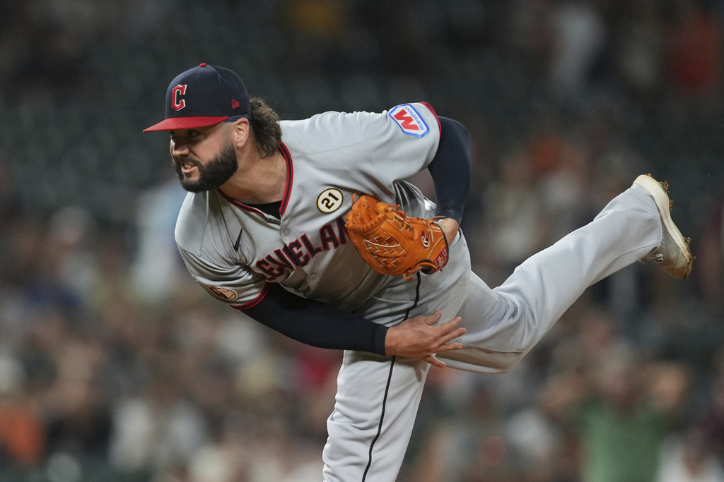 Cleveland Guardians pitcher Jakob Junis throws against the Detroit Tigers during the 10th inning of a baseball game Tuesday, Sept. 16, 2025, in Detroit. (AP Photo/Paul Sancya)