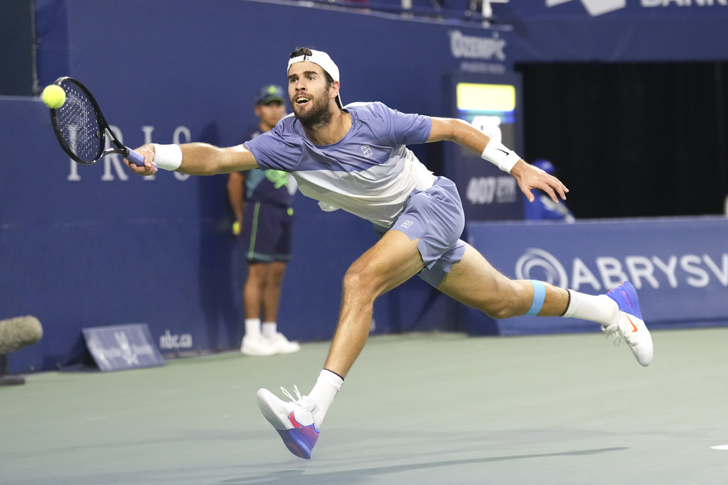Karen Khachanov, of Russia, returns to Ben Shelton, of the United States, during the men's final at the National Bank Open tennis tournament in Toronto, Thursday, Aug. 7, 2025. (Chris Young/The Canadian Press via AP)