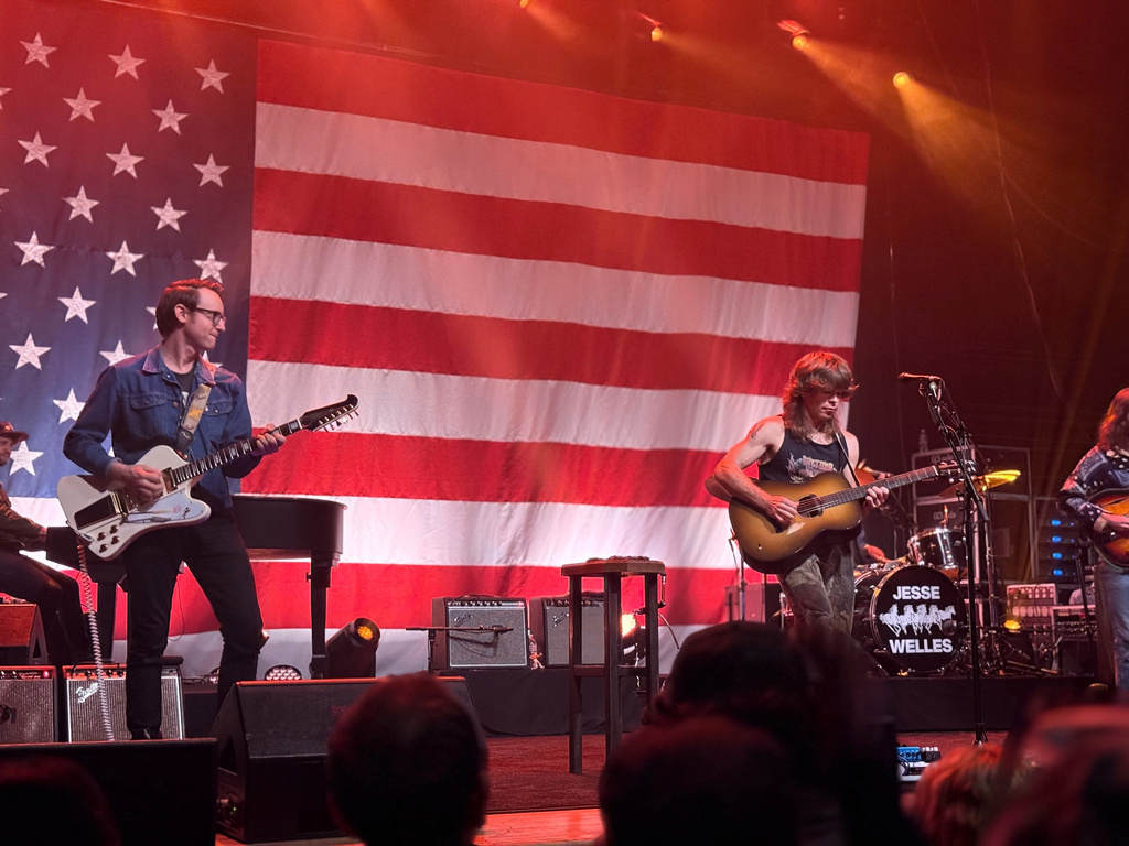 Singer-songwriter Jesse Welles performs with members of his band in Detroit, March 10, 2026. (AP Photo/Ted Anthony)