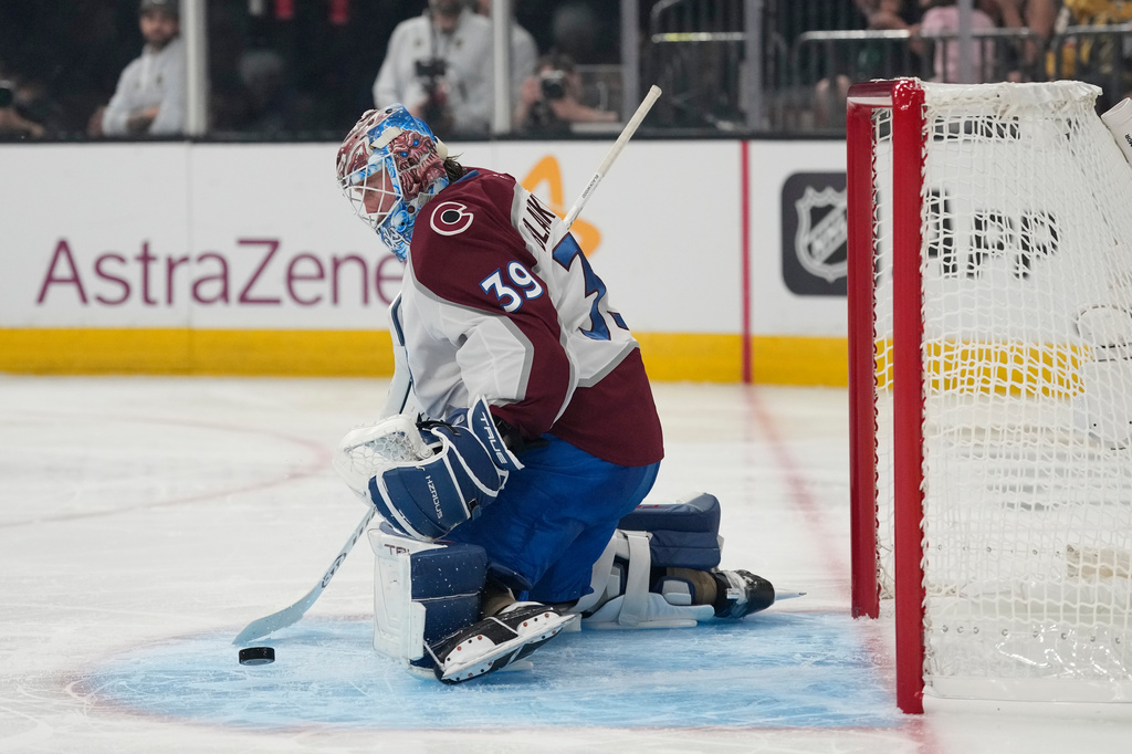 Colorado Avalanche goaltender MacKenzie Blackwood (39) stops the puck during the second period in Game 4 of the Western Conference finals NHL hockey Stanley Cup playoff series against the Vegas Golden Knights Tuesday, May 26, 2026, in Las Vegas. (AP Photo/John Locher)