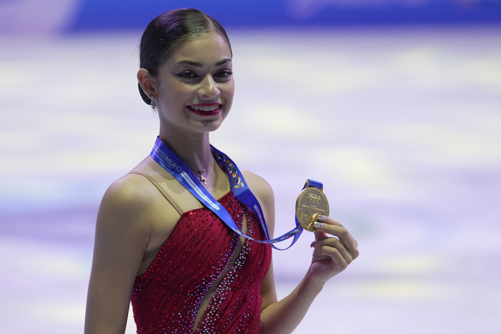 Adeliia Petrosian of Russia, competing as a neutral athlete, with her Gold medal in Women free skating at the ISU Skate to Milano figure skating qualifier 2025, in Beijing, China, Saturday, Sept. 20, 2025. (AP Photo/Mahesh Kumar A.)