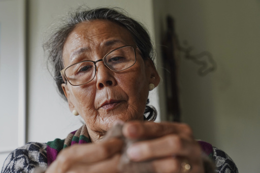 66-year-old retiree Kirstine Berthelsen prepares wool for sewing at her home in northern Copenhagen, Denmark, Sept. 17, 2025. (AP Photo/James Brooks) 66-year-old retiree Kirstine Berthelsen prepares wool for sewing at her home in northern Copenhagen, Denmark, Sept. 17, 2025. (AP Photo/James Brooks)