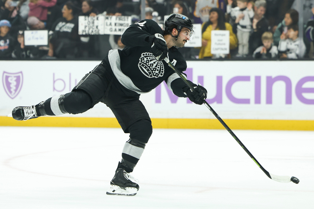 Los Angeles Kings center Phillip Danault warms up before an NHL hockey game against the Vancouver Canucks, Saturday, Nov. 29, 2025, in Los Angeles. (AP Photo/Jessie Alcheh)